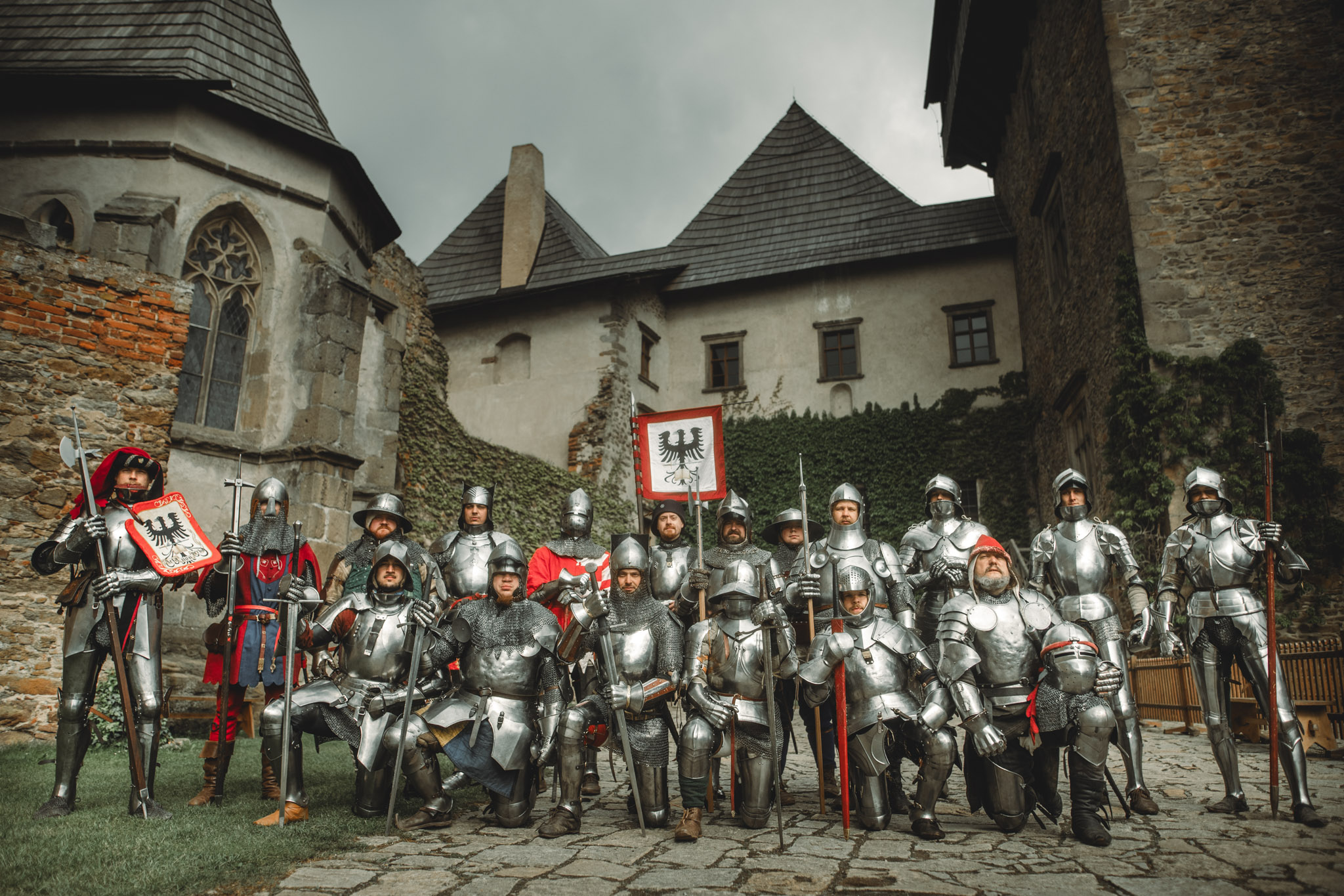 Adeptus fighters in full armor inside a gothic church