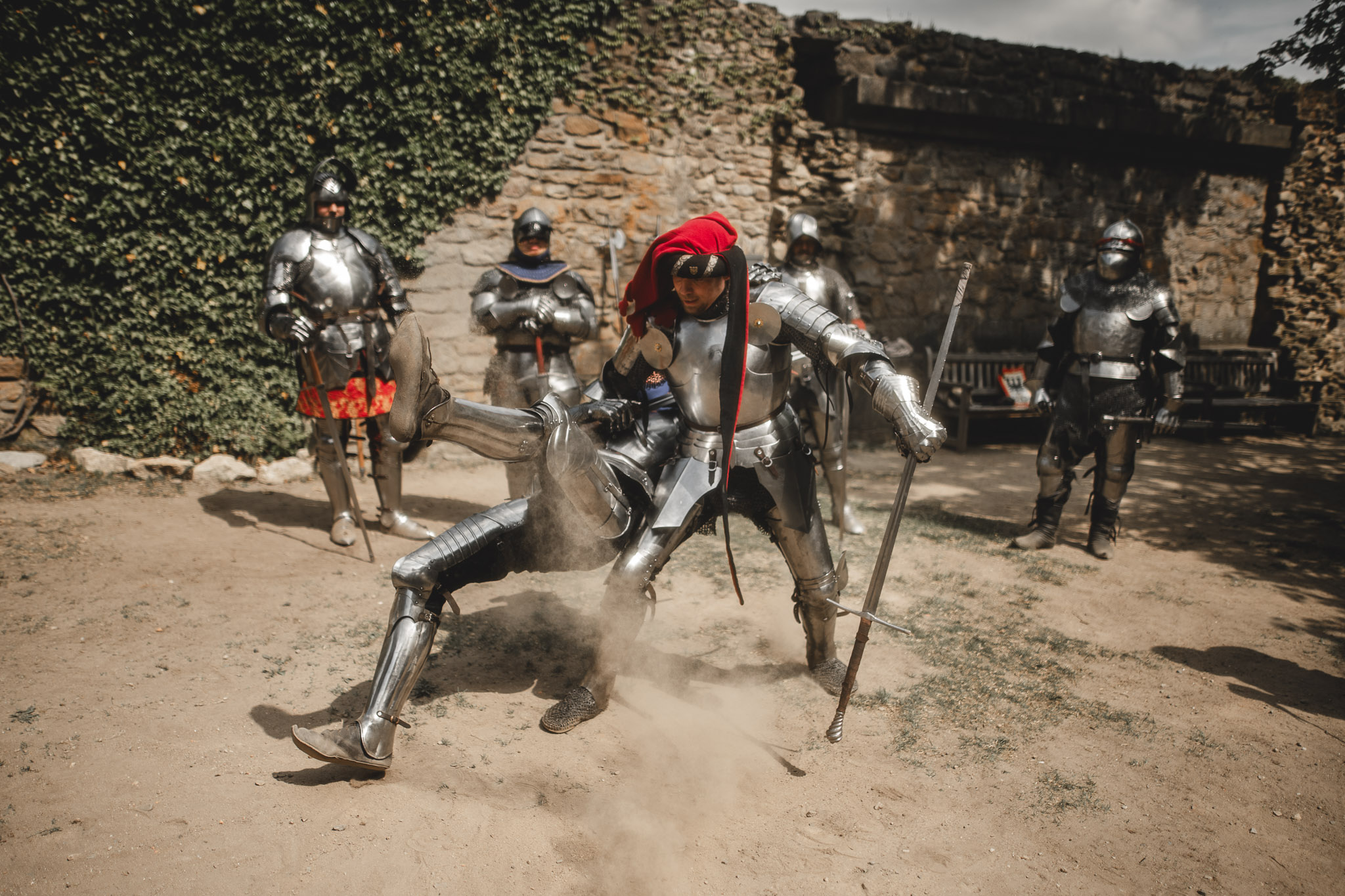 Adeptus fighters with polearms in a castle ruin